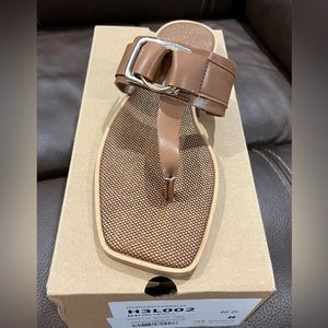 Sandals brown/tan in color